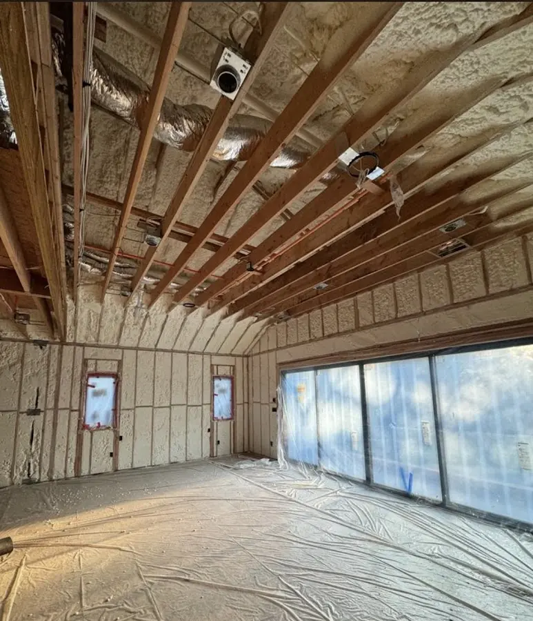 Interior walls and ceiling insulated with spray foam during new construction in Boaz